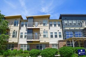 Chester apartment for rent - an apartment building with a blue sky in the background