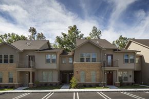 Cedar Knolls apartment for rent - an apartment building with a parking lot in front of it
