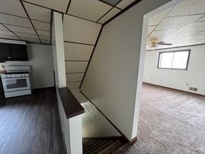 West Homestead apartment for rent - a view of a living room from the stairs