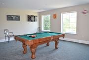 Pennington apartment for rent - a game room with a pool table and two windows