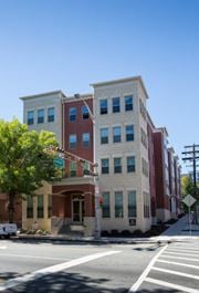 Newark apartment for rent - a building on a street corner with a traffic light