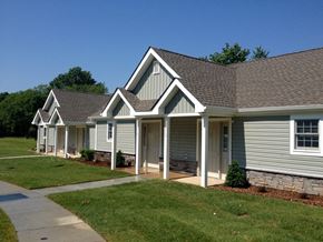Wilmington apartment for rent - A house with a grey siding and white trim.