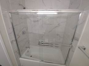 Palo Alto apartment for rent - a shower with a glass door in a bathroom