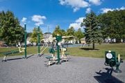 Farmingdale apartment for rent - a playground in a park on a sunny day