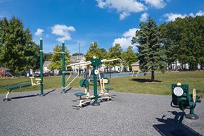 Farmingdale apartment for rent - a playground in a park on a sunny day