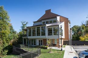 Bladensburg apartment for rent - a large house with a sidewalk in front of it