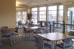 Bladensburg apartment for rent - a dining room with tables and chairs and large windows