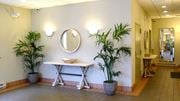 West New York apartment for rent - a bathroom with a table and plants in a lobby