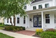Pilesgrove apartment for rent - the front of a white house with a blue door