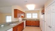 Pilesgrove apartment for rent - a kitchen with a sink and a refrigerator