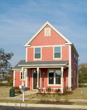 Pleasantville apartment for rent - a red house with a parking meter in front of it
