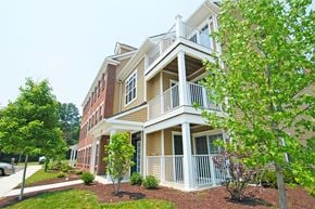 Elkridge apartment for rent - an apartment building with balconies and trees