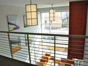 Camden apartment for rent - a view from the top of a staircase looking out into a large window
