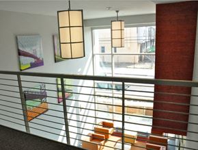 Camden apartment for rent - a view from the top of a staircase looking out into a large window
