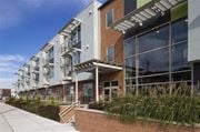 Camden apartment for rent - a row of buildings with large windows and a sidewalk