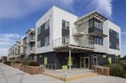 Camden apartment for rent - a row of apartment buildings with balconies and stairs