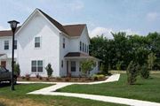 Salisbury apartment for rent - a white house with a truck parked in the driveway