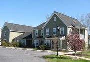 Salisbury apartment for rent - a green house with a street light in front of it