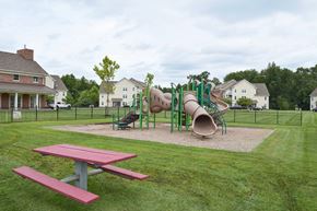 Williamstown apartment for rent - A playground with a red picnic table and a green slide.