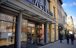 Washington apartment for rent - pedestrians walk past the entrance to the west end of a store