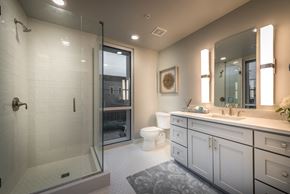 Gretna apartment for rent - a bathroom with a shower and a sink and a toilet