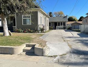 San Bernardino apartment for rent - a street with some cement steps in front of a house