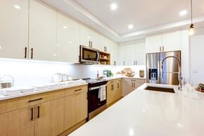 Long Beach apartment for rent - a large kitchen with a counter top and a sink
