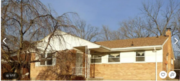 Cincinnati house for rent - A house with a white roof and a brown wall.