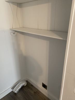Lindale apartment for rent - a small closet with a white wall and a shelf