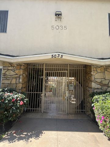 N. Hollywood apartment for rent - the front door of a building with a gate