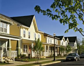 Bridgeton apartment for rent - A row of houses with a car parked on the street.