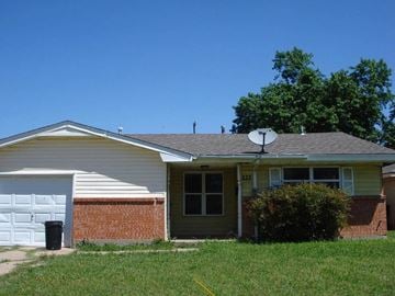 Oklahoma City house for rent - a house with a satellite dish on the roof