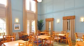 Camden apartment for rent - a dining room with wooden tables and chairs