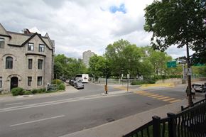 Montreal apartment for rent - a view of a city street from a sidewalk