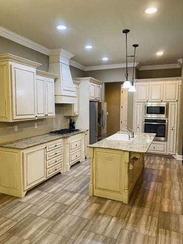 Broussard house for rent - a kitchen with white cabinets and a marble counter top