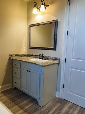Broussard house for rent - a bathroom with a sink and a mirror