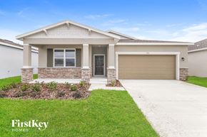 Bartow house for rent - a brand new house with a driveway and a garage door