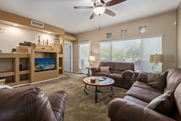 Oro Valley house for rent - a living room with couches and a coffee table