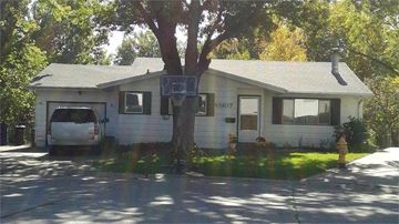 Bettendorf apartment for rent - a white house with a tree in front of it