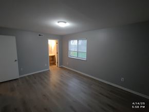 Batavia apartment for rent - A room with a doorway leading to another room.