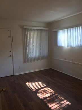 Goleta apartment for rent - A room with a white door and a window with blinds.