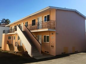 Santa Barbara apartment for rent - A two-story building with a balcony on the second floor.