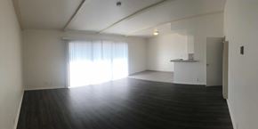 Goleta apartment for rent - A large empty room with wooden floors and white walls.