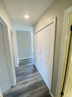 Lafayette apartment for rent - the hallway of a home with white closets and wood floors