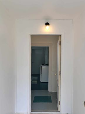 Westville apartment for rent - A white door with a light on it.