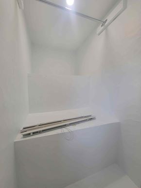 Westville apartment for rent - A white bathroom with a shower and a white tub.