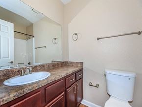Indio apartment for rent - a bathroom with a sink toilet and a mirror