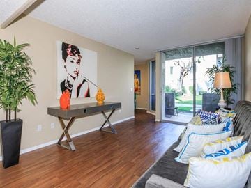 Palm Springs apartment for rent - a living room with a couch and a table