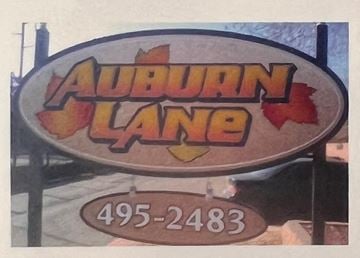 Oklahoma City apartment for rent - A sign that says Auburn Lane with a phone number on it.