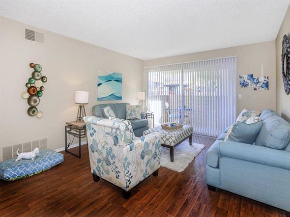 Palm Springs apartment for rent - a living room with furniture and a sliding glass door